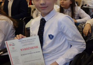 Uczeń naszej szkoły w Warszawie podczas odbioru nagród.